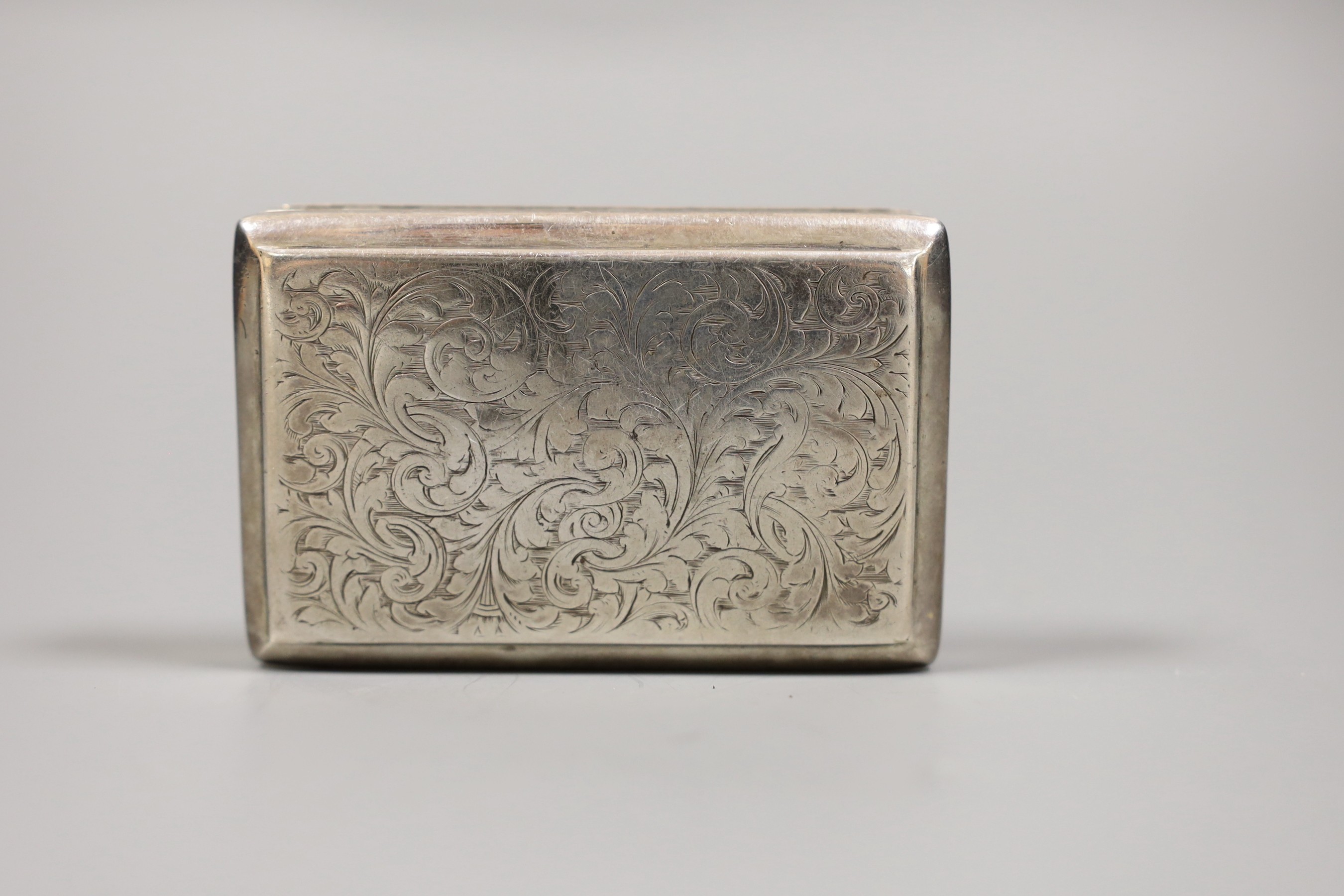 A Victorian engraved silver rectangular snuff box, Frederick Marson, Birmingham, 1861, 84mm.